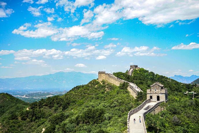 a stone wall on a hill